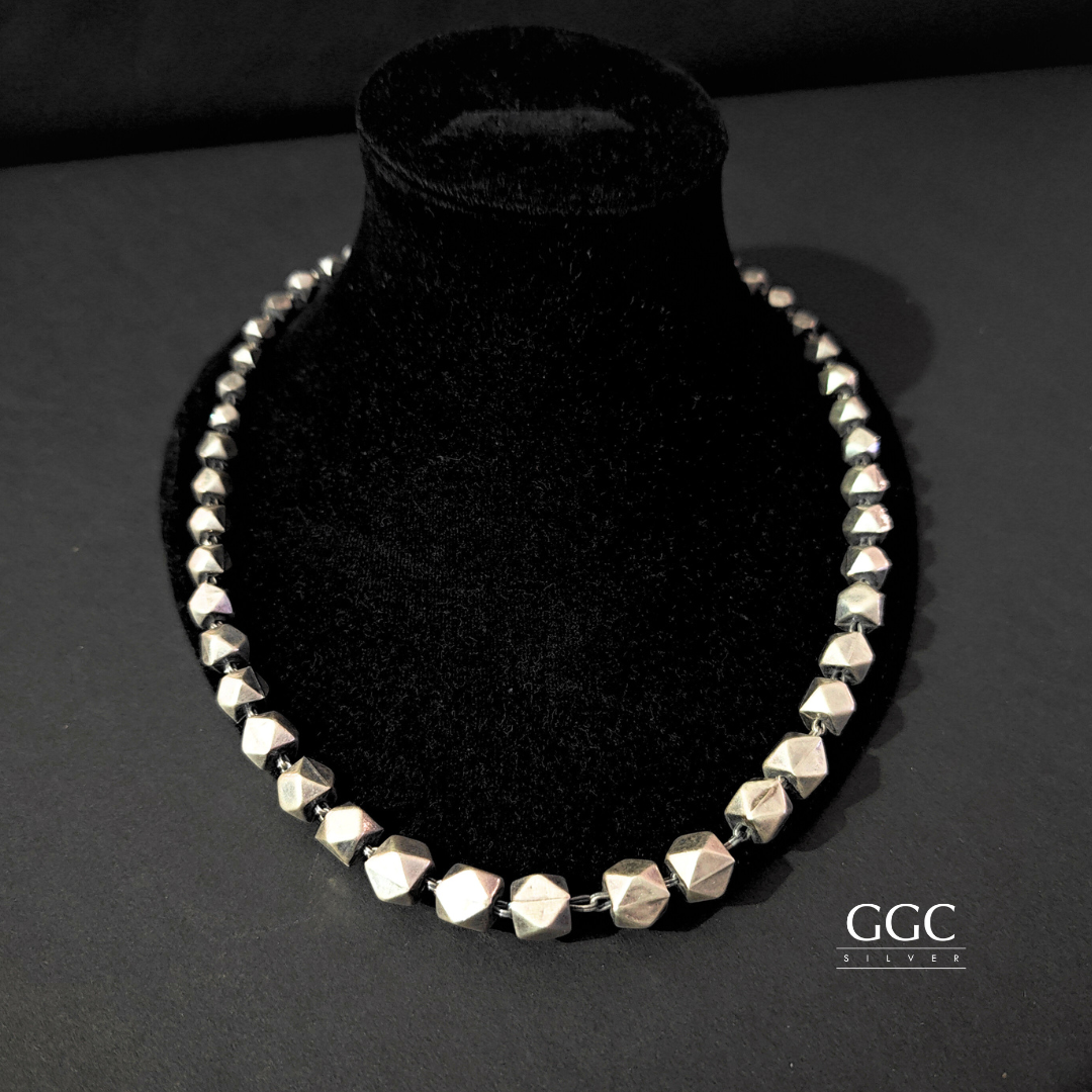Triangular ball necklace