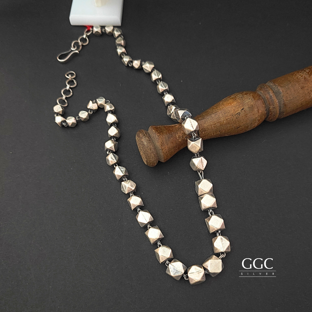 Triangular ball necklace