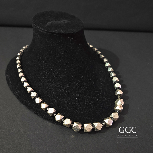 Triangular ball necklace