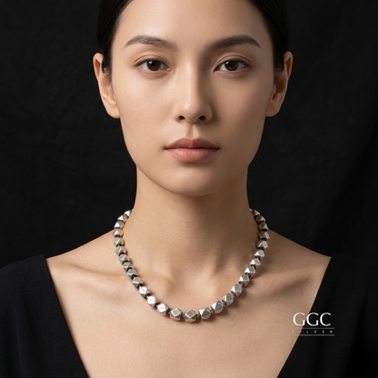 Triangular ball necklace