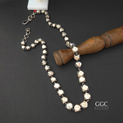 Triangular ball necklace